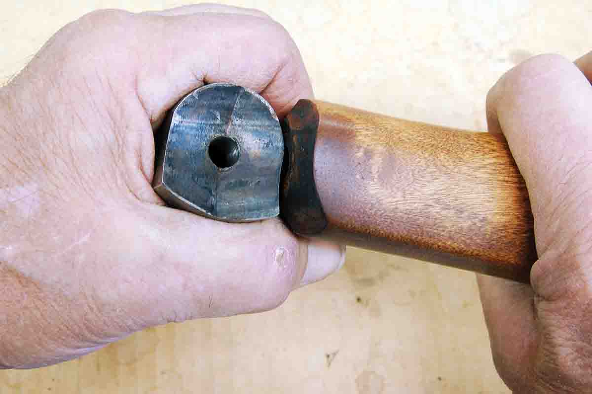 The rounded cavity in the receiver leads to a loose-fitting stock.